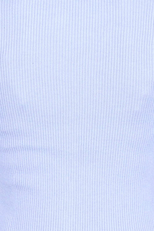 Close up of ribbed textured blue fabric.