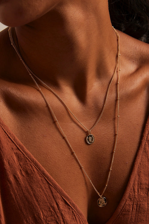 model wearing Double Layered Coin Gold Necklace