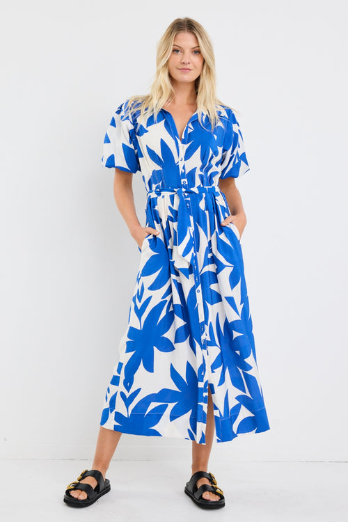 model wears a blue and white puff sleeve midi dress