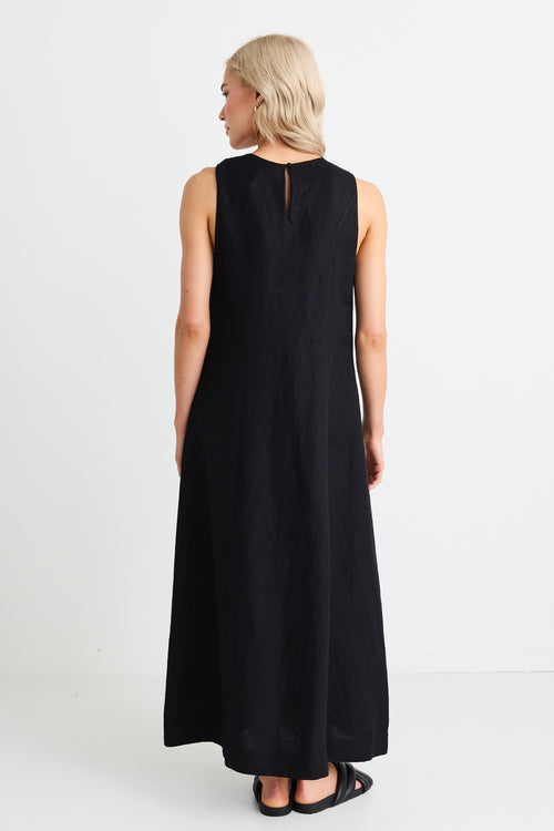 Model wears maxi linen black dress