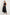 model wearing long black linen dress