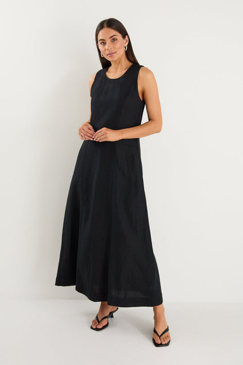 model wearing long black linen dress