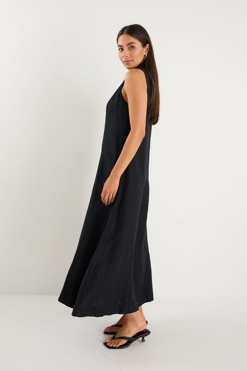 model wearing long black linen dress