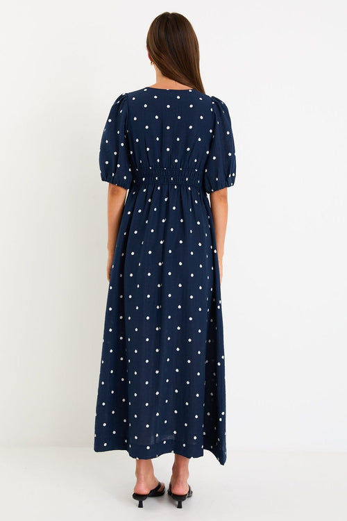 Shop Eloquent Navy Polka Dot Puff Sleeve Maxi Dress | Flo & Frankie Shop Eloquent Navy Polka Dot Puff Sleeve Maxi Dress | Flo & Frankie