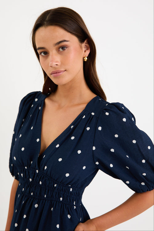 Shop Eloquent Navy Polka Dot Puff Sleeve Maxi Dress | Flo & Frankie Shop Eloquent Navy Polka Dot Puff Sleeve Maxi Dress | Flo & Frankie