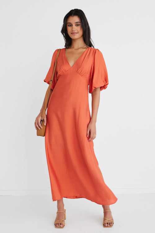 Model wears Orange Puff Sleeve Midi Dress