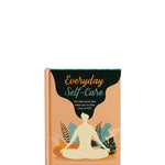 Book titled 'Everyday Self-Care' with a silhouette of a person meditating on the cover.