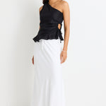 model wears a white linen maxi skirt