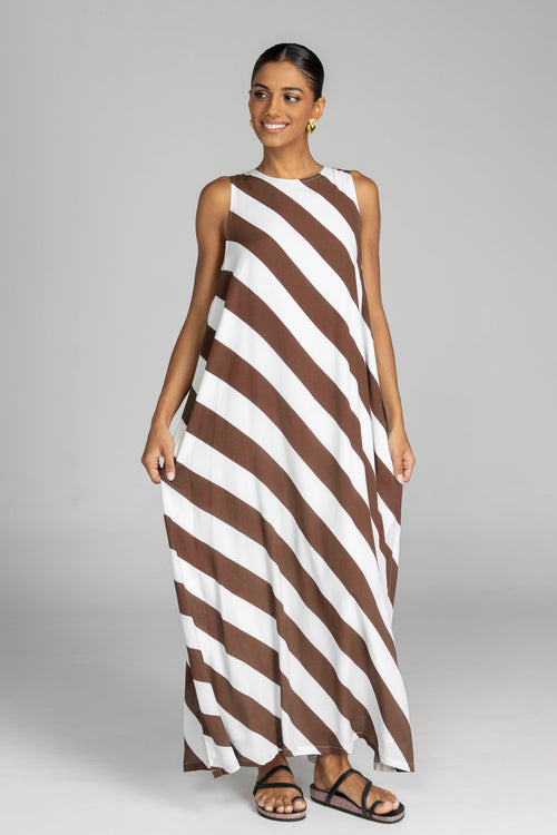 model wearing chocolate and white striped maxi dress