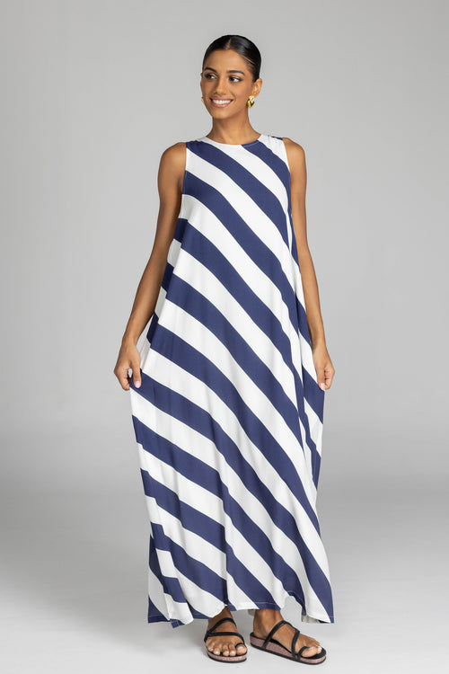 model wearing a navy and white striped maxi dress