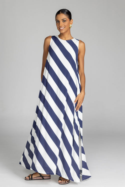 model wearing a navy and white striped maxi dress
