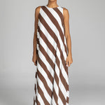 model wearing chocolate and white striped maxi dress