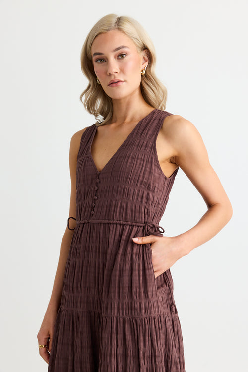 model wears a brown cotton maxi dress