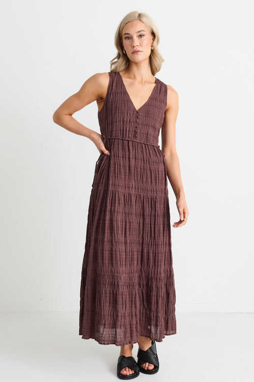 model wears a brown cotton maxi dress