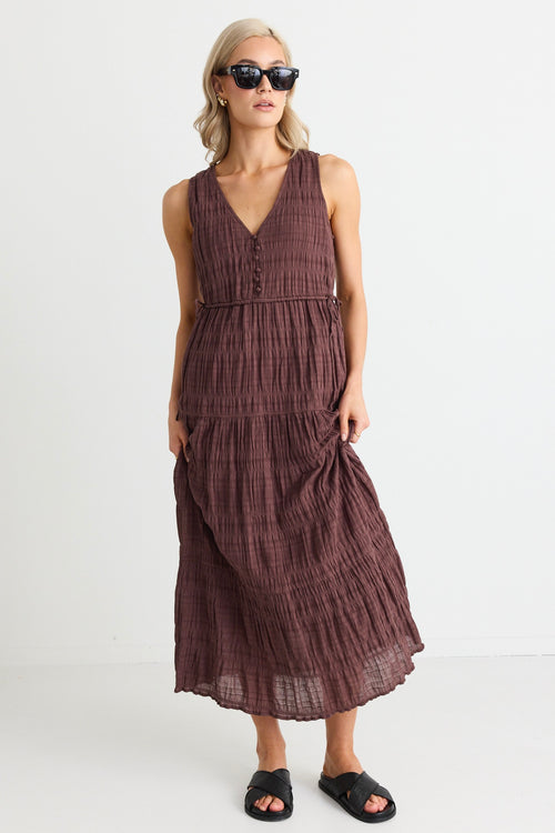 model wears a brown cotton maxi dress