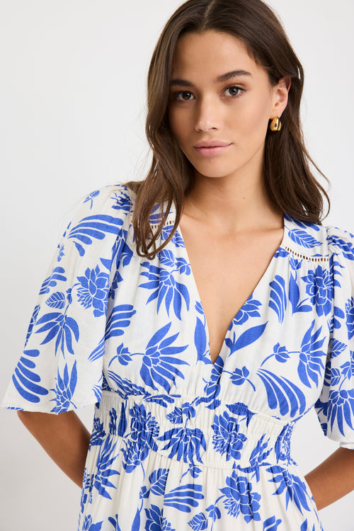 blue blouse dress with flowers cuffed sleeves Shop Fluent Blue Lotus Flutter Sleeve Tiered Maxi Dress