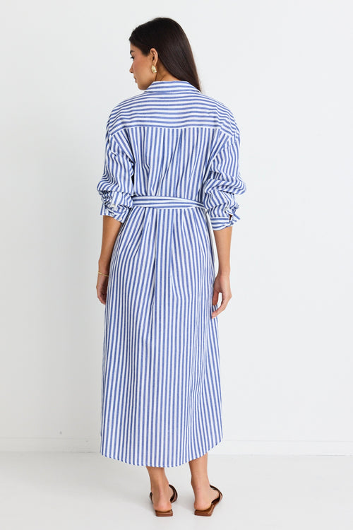 model wears a blue stripe shirt dress