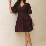model wearing burgundy dress
