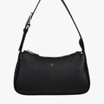 A small black vegan leather shoulder bag with a softly structured silhouette, featuring a grainy pebble texture, gold zip closure, and an adjustable black strap. The front is finished with a subtle gold cross logo, adding a touch of elegance.