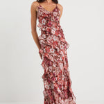 Woman wearing a floral dress on a white background