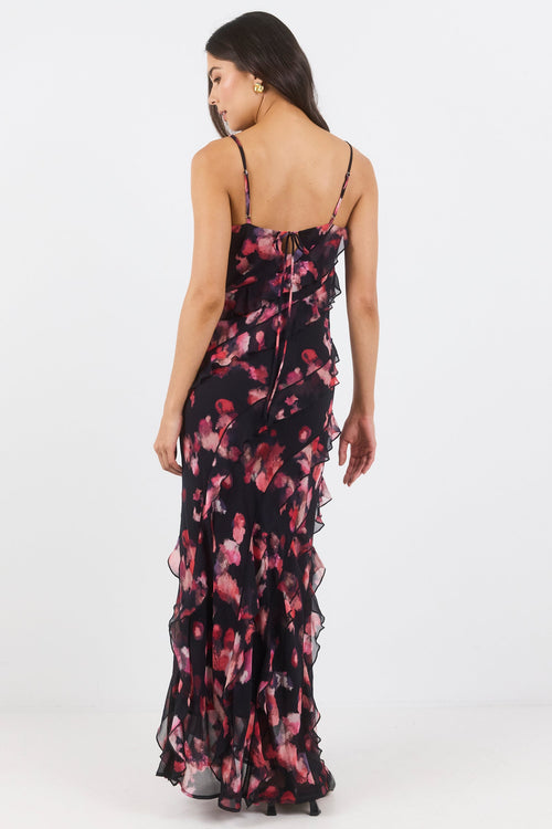 Woman wearing a floral dress on a white background