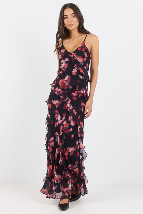 Woman wearing a floral dress on a white background