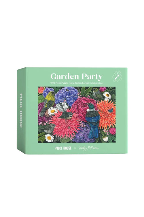 Garden Party jigsaw puzzle box by artist Candy McPherson, featuring a colorful floral and bird illustration on a mint green background.