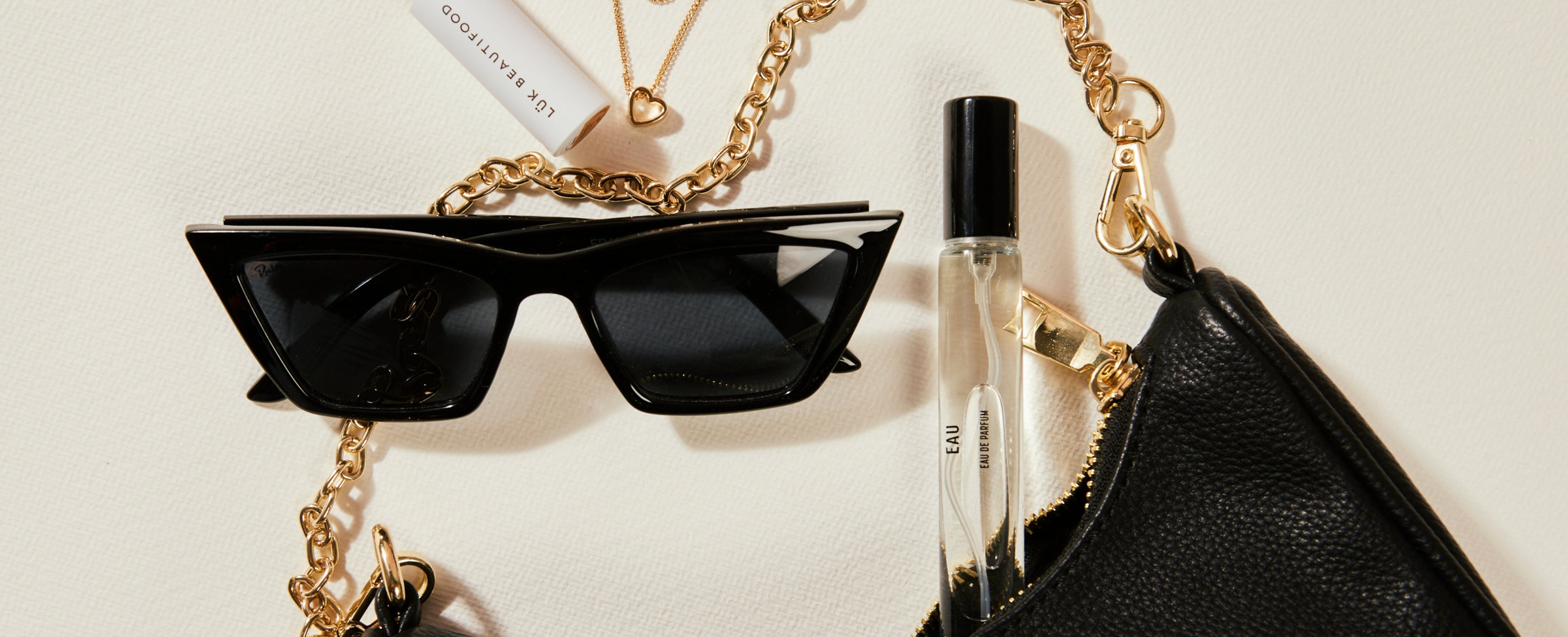 Image of sunglasses and bag