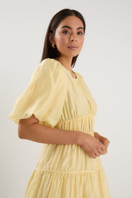 Shop Girlfriend Butter Puff Sleeve Tie Back Mini Dress | Flo & Frankie Shop Girlfriend Butter Puff Sleeve Tie Back Mini Dress | Flo & Frankie