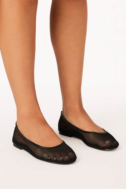 black ballet flats