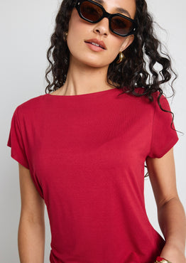 model wears a red t shirt