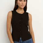 model wearing black linen vest