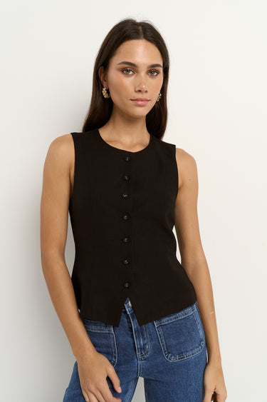 model wearing black linen vest
