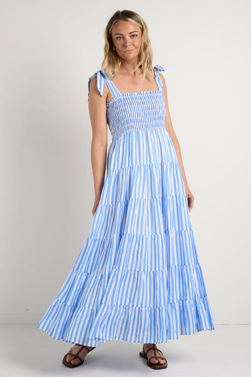 model wears a blue stripe maxi dress