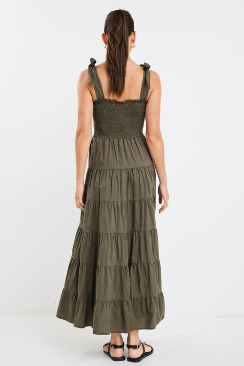 model wears a khaki maxi dress