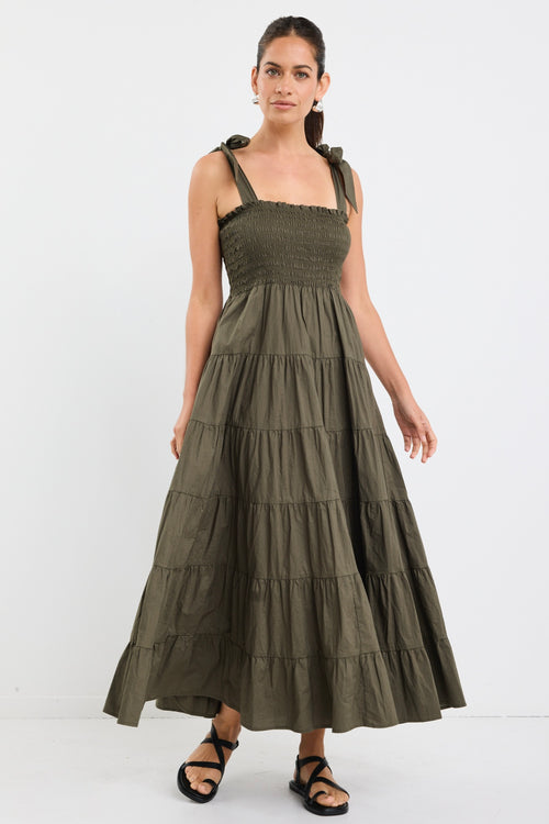 model wears a khaki maxi dress