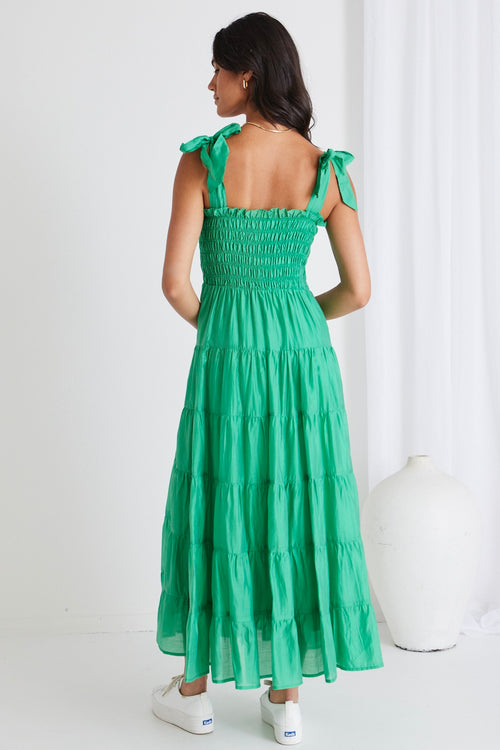 model wears green cotton maxi dress