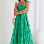 model wears green cotton maxi dress