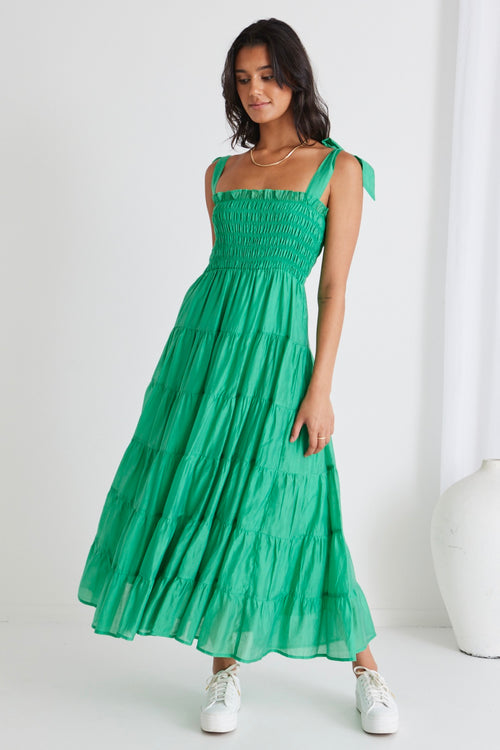 model wears green cotton maxi dress