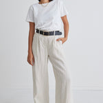 model wears a beige linen pant