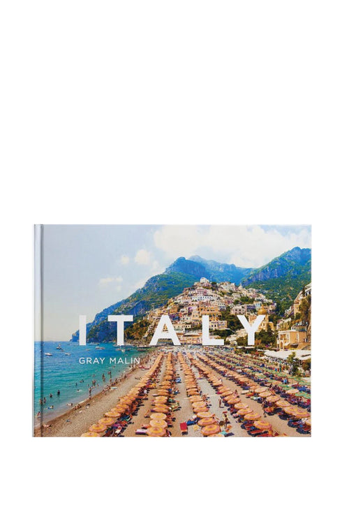 Book cover of 'Italy' by Gray Malin with a scenic view of a coastal town.