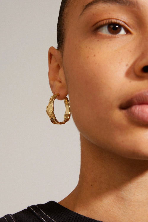 gold hoop earring