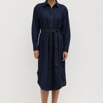 Model wearing dark denim shirt dress 
