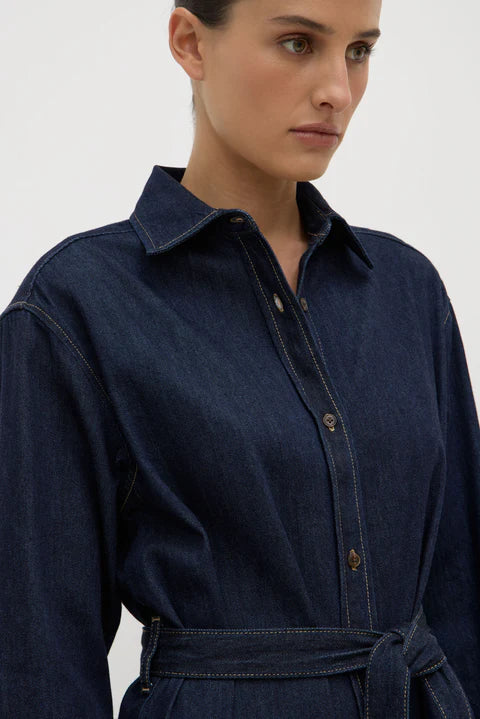 Model wearing dark denim shirt dress 