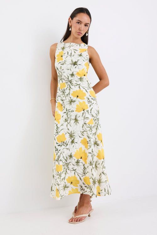 woman wearing buttercup floral dress
