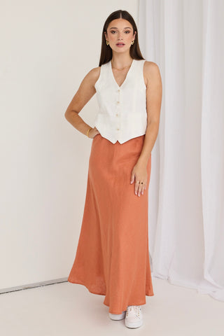 model wears a orange linen skirt