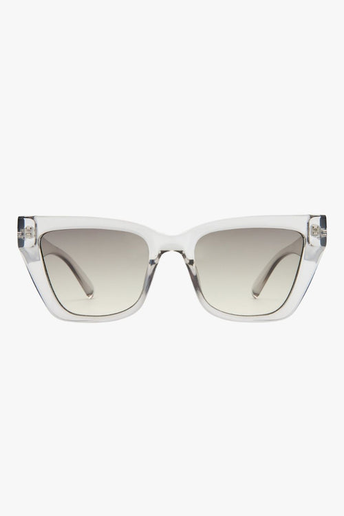 Transparent square cat-eye sunglasses with smoke gradient lenses.