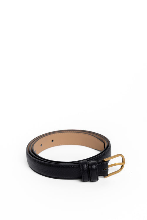 Black leather belt with a gold buckle on a white background