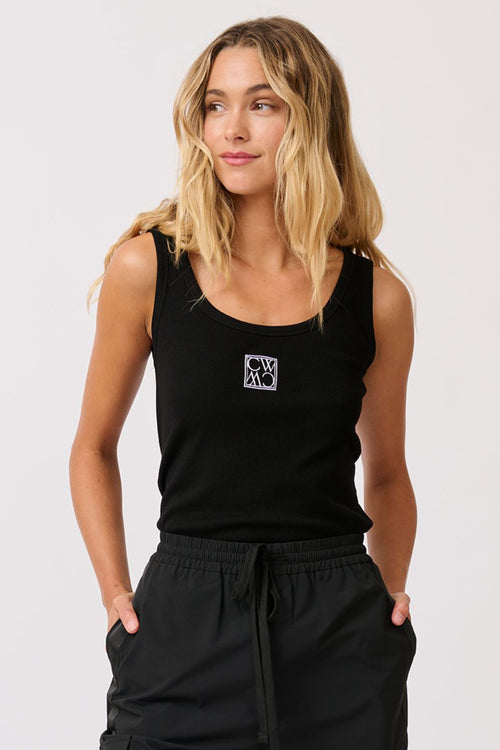 model wears a black logo tank