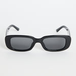 Glossy black rectangular sunglasses with dark tinted lenses, photographed on a white background.